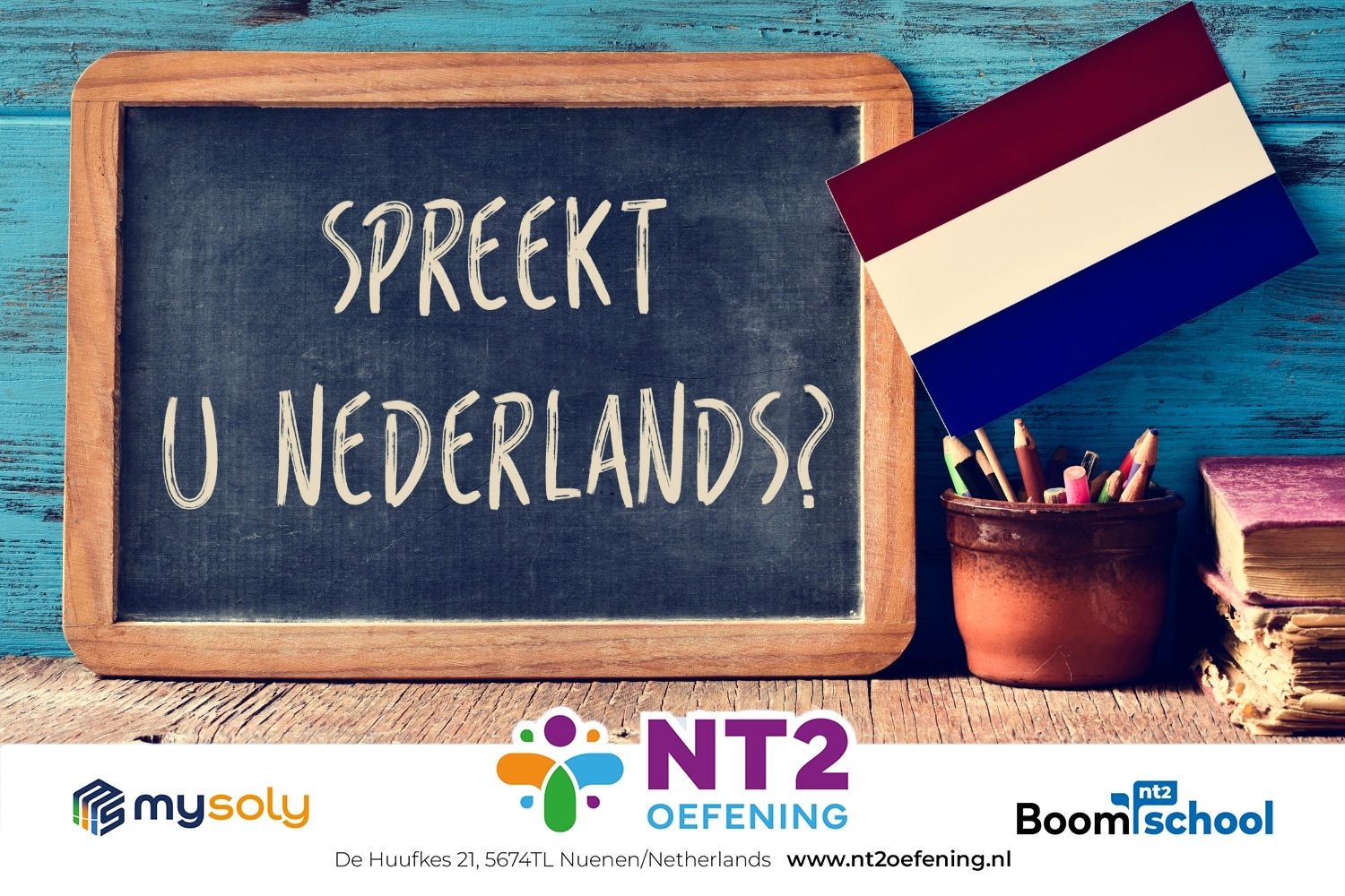 A blackboard with the words "Spreekt Nederlands?" and a Dutch flag next to it